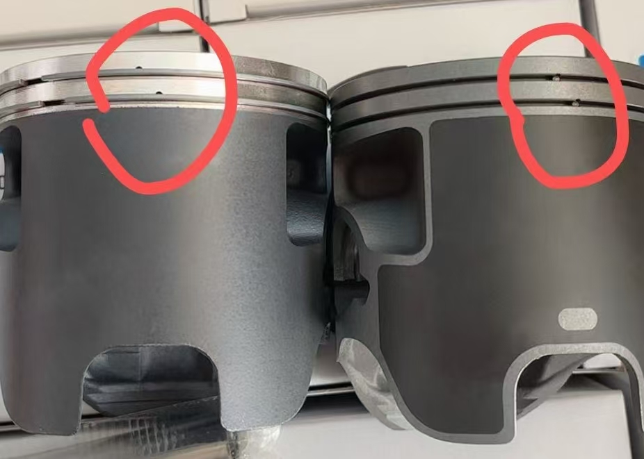 KTM 300 piston showing locating pin positions  pins are close together but not aligned