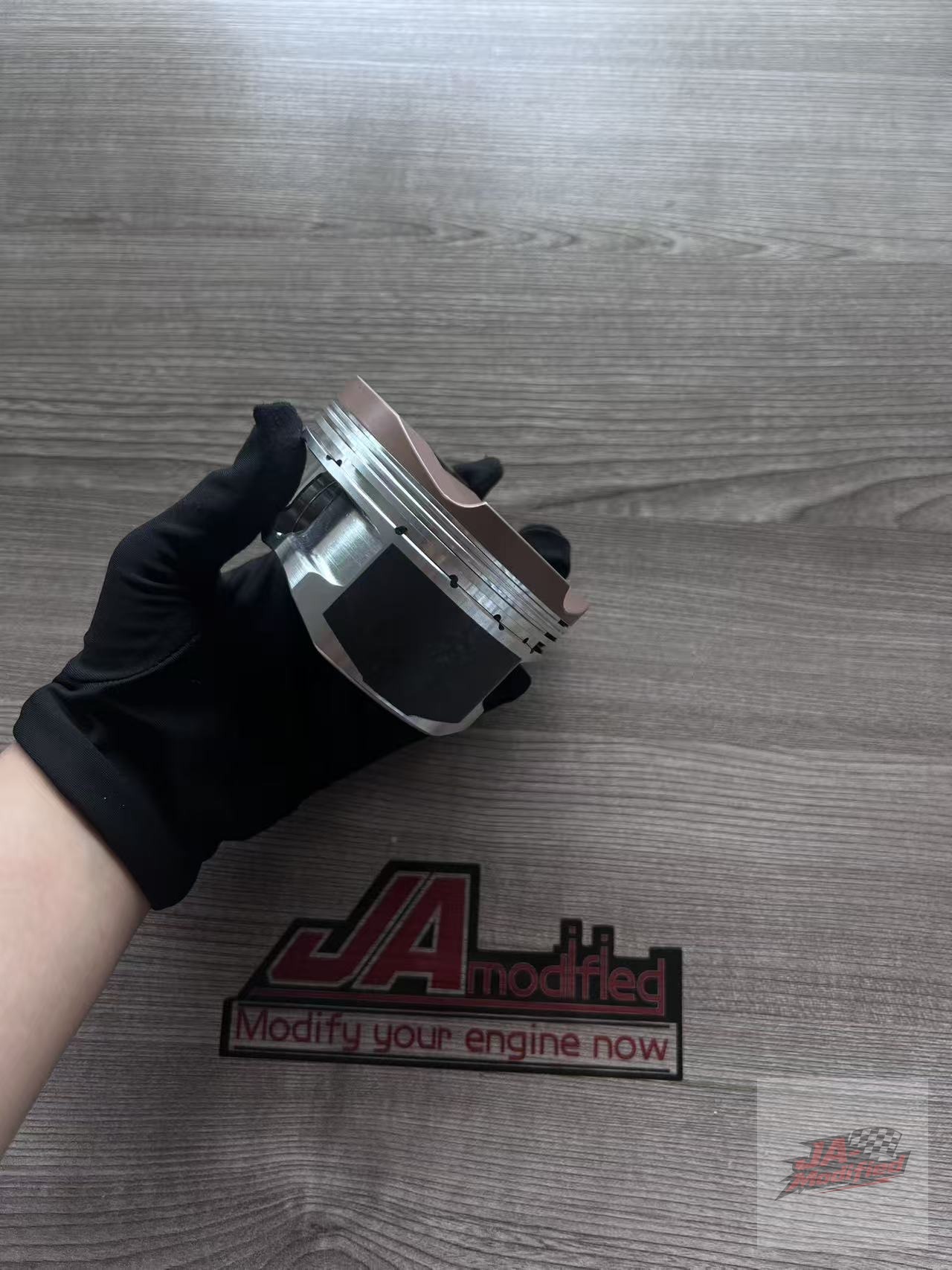 Custom forged piston side profile and crown structure
