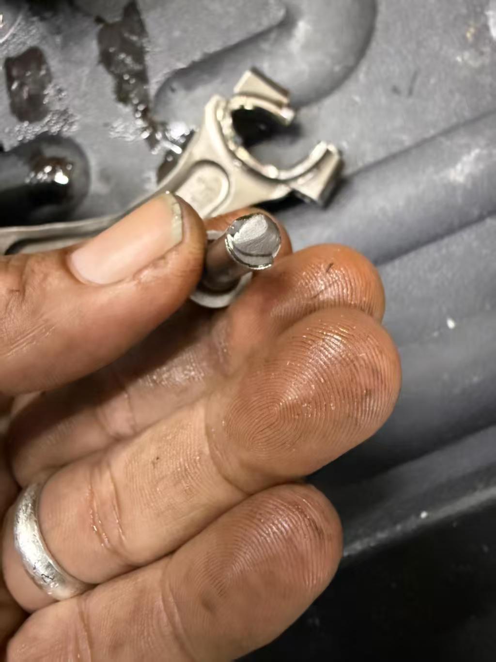 Fractured connecting rod bolt section
